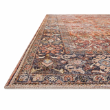 The Layla Collection is traditional and timeless, with a beautiful lived-in design that captures the spirit of an old-world rug. This traditional power-loomed rug is crafted of 100% polyester with a classic and sophisticated color palette and subtle patina.  Power Loomed 100% Polyester LAY-02 Spice/Marine