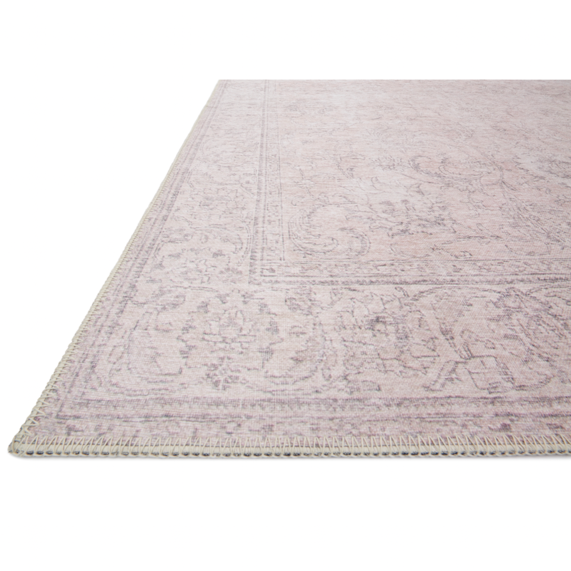 Timeless and classic, the Loloi Loren Sand Area Rug, or LQ-12, offers vintage hand-knotted looks at an affordable price. Created in Turkey using the most advanced rug-making technology, these printed designs provide a textured effect by portraying every single individual knot on a soft polyester base. 