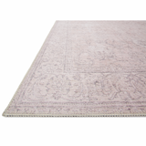 Timeless and classic, the Loloi Loren Sand Area Rug, or LQ-12, offers vintage hand-knotted looks at an affordable price. Created in Turkey using the most advanced rug-making technology, these printed designs provide a textured effect by portraying every single individual knot on a soft polyester base. 