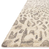 Hooked of 100% wool, this Masai Collection is a softer side of the savannah brought to life by artisans in India. Masai is a beautiful contemporary rug with contrasting hues and is a chic twist on the classic animal print.  Hooked 100% Wool MAS-02 Grey / Ivory