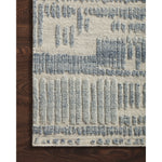 The Loloi Naomi Ivory / Denim Area Rug, or NAO-04 is hand-knotted of wool and cotton by artisans in India. Naomi offers bold designs with earthy hues and features a high-low pile that adds depth and dimension, making each piece create the illusion of movement. A perfect rug for your living room, entryway, or other space