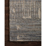 The Loloi Naomi Beige / Slate Area Rug, or NAO-06 is hand-knotted of wool and cotton by artisans in India. Naomi offers bold designs with earthy hues and features a high-low pile that adds depth and dimension, making each piece create the illusion of movement. A perfect rug for your living room, entryway, or other space