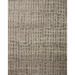 The Loloi Naomi Smoke / Ash Area Rug, or NAO-07 is hand-knotted of wool and cotton by artisans in India. Naomi offers bold designs with earthy hues and features a high-low pile that adds depth and dimension, making each piece create the illusion of movement. A perfect rug for your living room, entryway, or other space