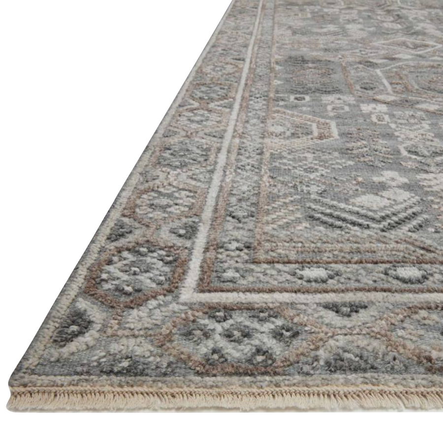 Timeless yet modern, the Nola Slate / Granite Area Rug is hand-knotted in India of viscose, cotton, wool and other fibers. The tonal collection showcases an elevated texture, accentuating the pattern in every piece.  Hand Knotted 66% Viscose | 25% Wool | 7% Cotton | 2% Other Fiber Pile NOL-01 Slate / Granite