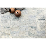 Drawing inspiration from tribal influences, the Odyssey Light BlueArea  Rug combines relaxed linear pattern with a sophisticated color palette. Each Odyssey area rug, which is hand knotted of wool, viscose, and cotton, is crafted entirely by hand by master artisans in India.  Hand Knotted 70% Viscose from Bamboo | 30% Wool OD-06 Light Blue