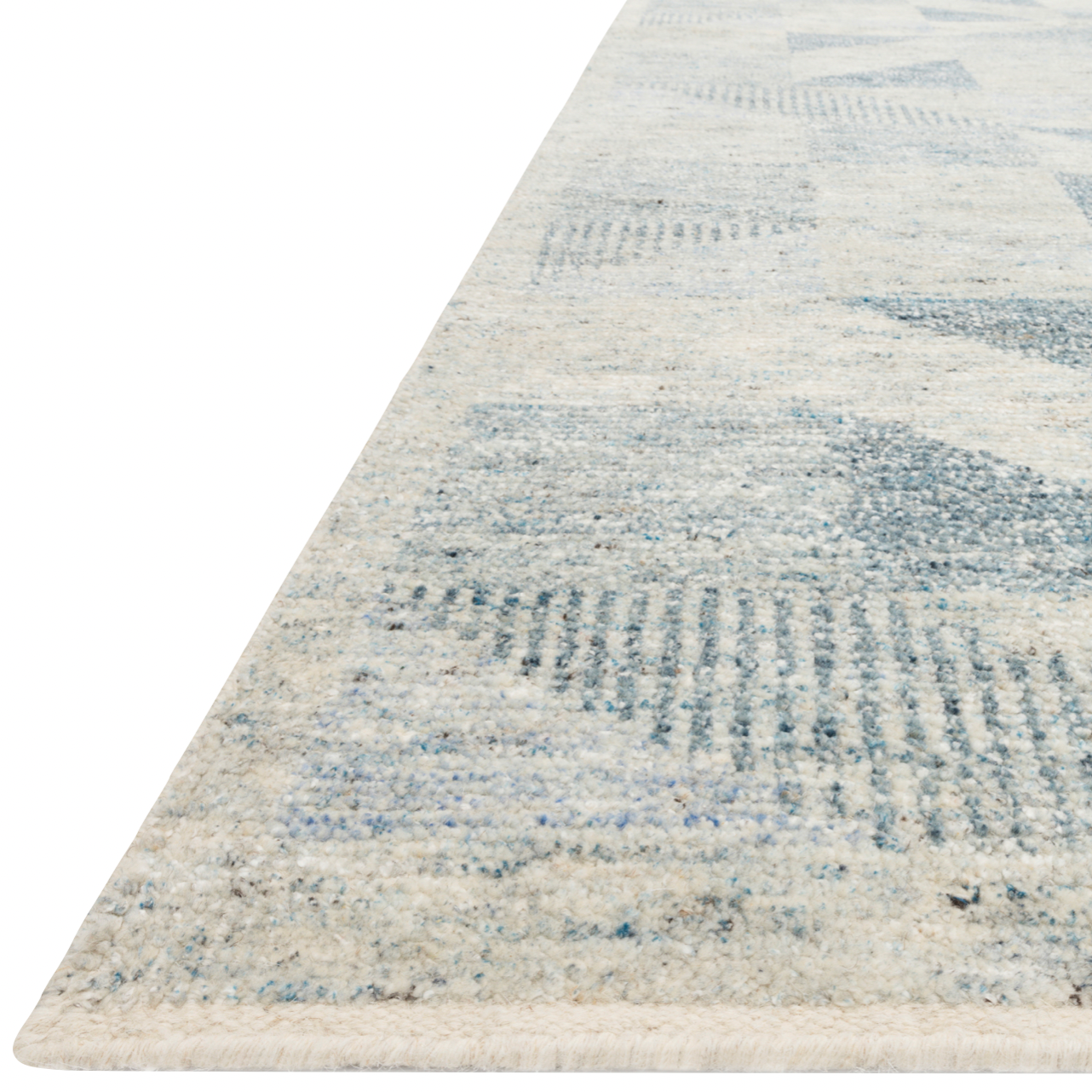Drawing inspiration from tribal influences, the Odyssey Light BlueArea  Rug combines relaxed linear pattern with a sophisticated color palette. Each Odyssey area rug, which is hand knotted of wool, viscose, and cotton, is crafted entirely by hand by master artisans in India.  Hand Knotted 70% Viscose from Bamboo | 30% Wool OD-06 Light Blue