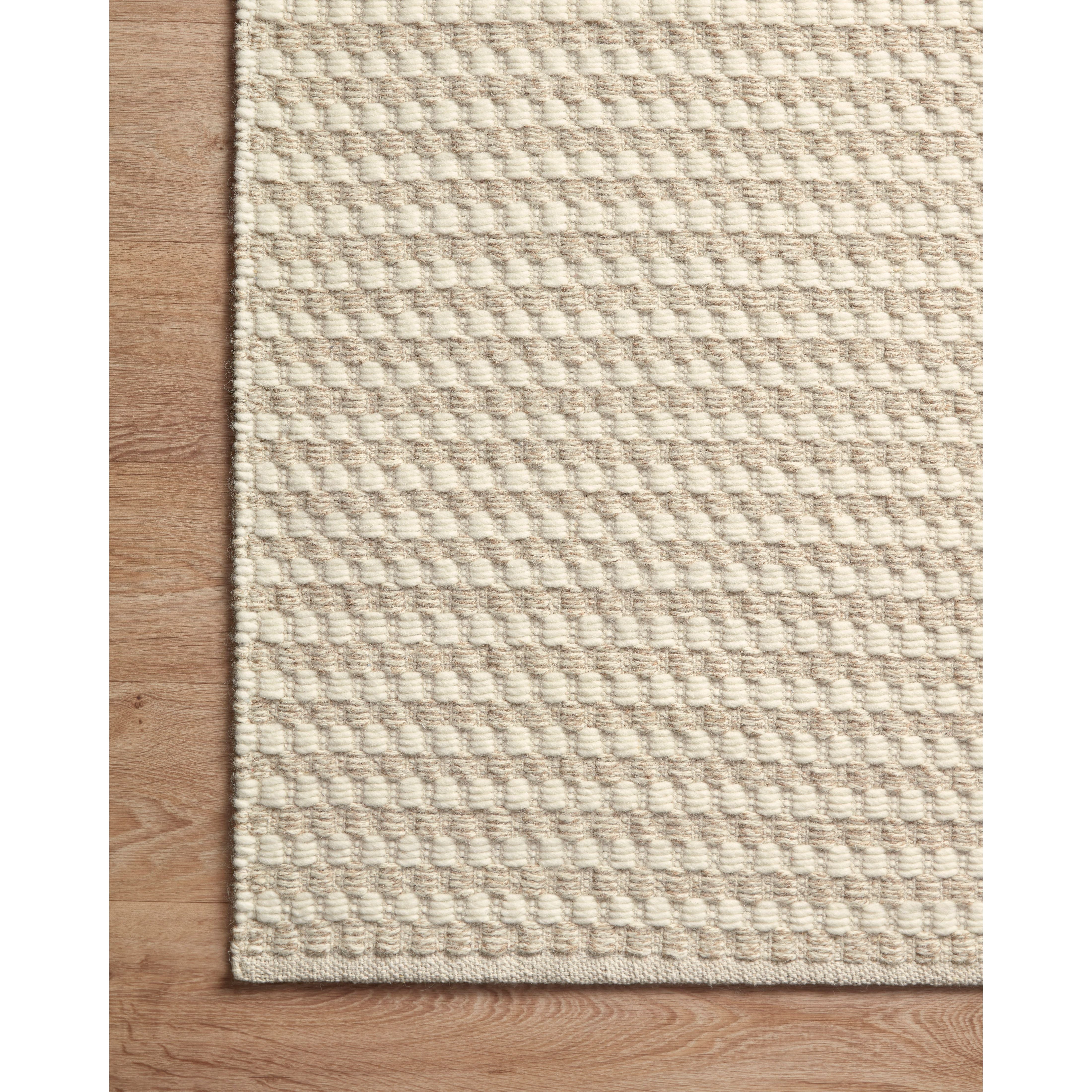 Hand-loomed of wool and cotton in India, the Ojai Collection for Amber Lewis x Loloi offers a series of understated neutrals that feels at once refined and relaxed. Ojai serves a timeless foundation that is sure to bring an elevated yet comfortable feel to any room. Ojai is also GoodWeave-Certified, ensuring our commitment to ethical product and the support of weavers' communities. OJA-01 AL Ivory / Natural