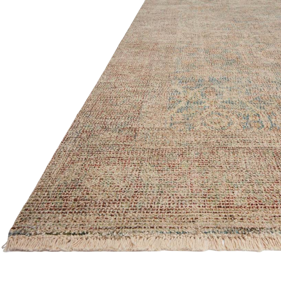 Hand-woven by skilled artisans, the Priya Denim / Rust Area Rug from Loloi offers beautiful tonal designs accentuated by a carefully curated color palette. Delicate yet strong, Priya is an instant classic made for today's home.  Hand Woven 51% Cotton | 29% Polyester | 12% Viscose | 8% Wool PRY-06 Denim/Rust Colors: Red, Orange, Ivory, Blue