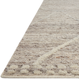Hand-woven of 100% wool in India, the Loloi Rayan Ash Area Rug, or RAY-05, sets the tone for a calming atmosphere. Each design is crafted of textural highs and lows paired with neutral tones to create and engaging understatement. The perfect rug for your bedroom, office, or other medium traffic area. 