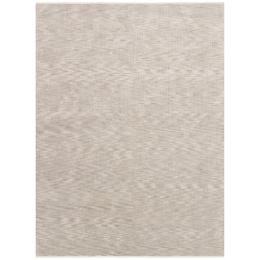 Intricately hand-knotted in India of wool and viscose pile, the Loloi Rhea Taupe Area Rug, or REH-01, is beautifully delicate with an oblique striping of a lace-like quality and a pearly, neutral color palette. The hi-lo pattern adds a sophisticated yet striking appeal to any living room or other high traffic area. 