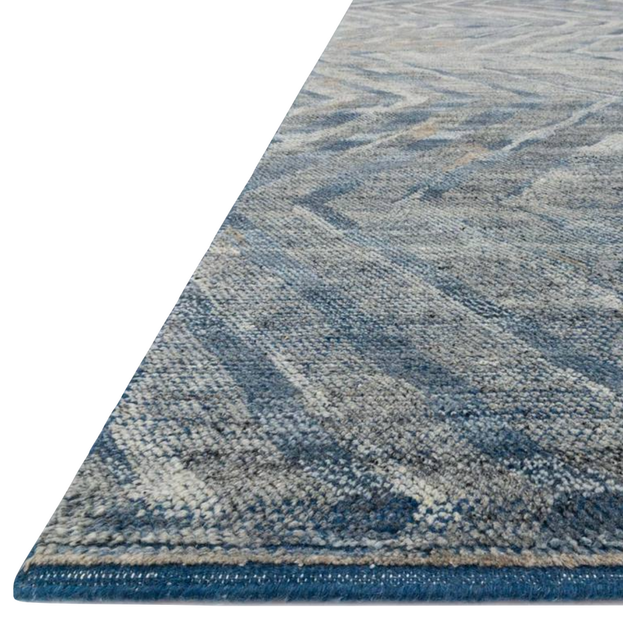 The Sumi Collection is hand-knotted of wool pile by artisans in India, with a moody and beguiling mix of stormy blues and greys. Bring a new level of sophistication to any room with its wide brushstrokes of color and refined design.  Hand Knotted 100% Wool Pile SUM-03 Denim / Mist