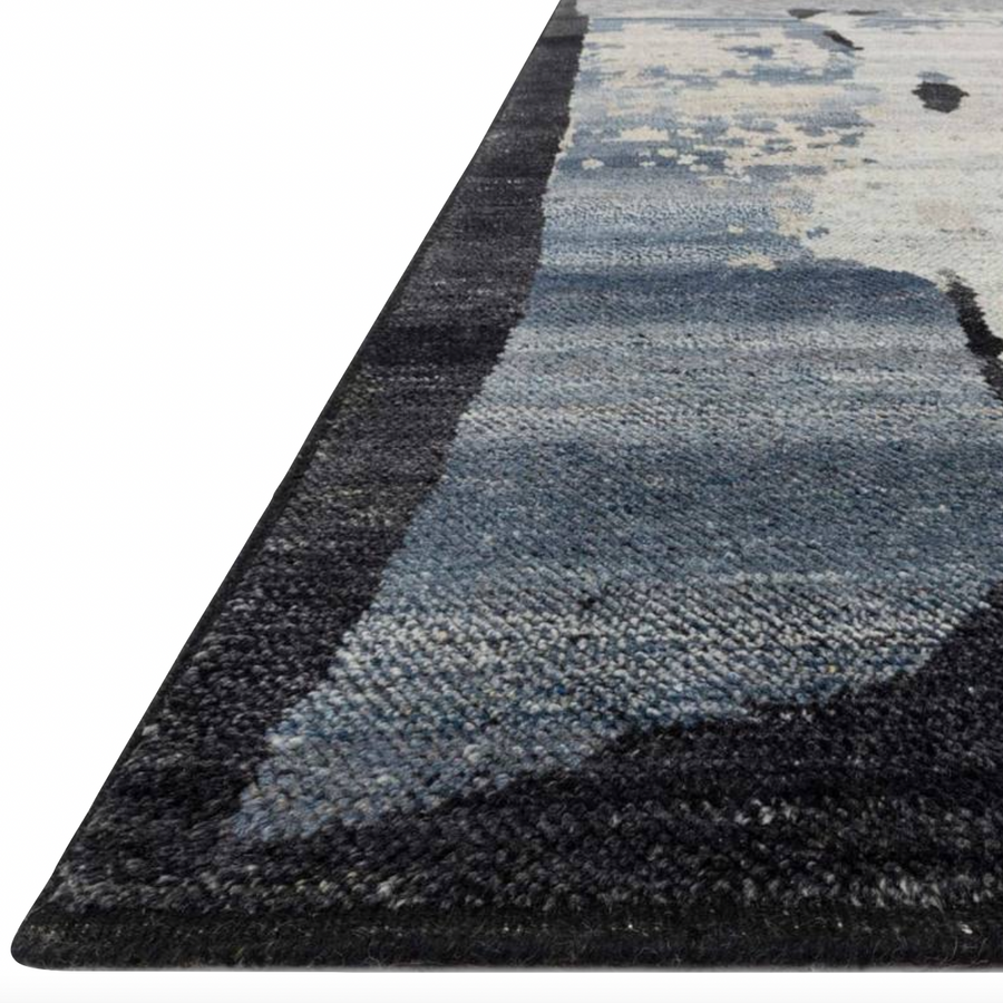 The Sumi Collection is hand-knotted of wool pile by artisans in India, with a moody and beguiling mix of stormy blues and greys. Bring a new level of sophistication to any room with its wide brushstrokes of color and refined design.  Hand Knotted 100% Wool Pile SUM-04 Mist / Onyx