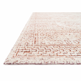 Hand-knotted in India of viscose and cotton, the Vestige White / Persimmon Area Rug recalls ancient khotan rugs in an updated color palette. Soft underfoot, the silken yarns temper the graphic motifs to create a versatile foundation.  Hand Knotted 88% Viscose | 12% Cotton VQ-01 White / Persimmon