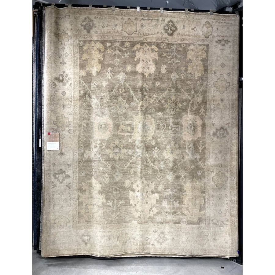 Hand knotted of 100% wool by skilled artisans, the Loloi Vincent Moss Gray /Stone Area Rug, or VC-02, offers the look of a well-worn antique rug in a modern day color palette. Each exquisite piece undergoes a weeks-long antique washing process which fades the pattern and color beautifully. 