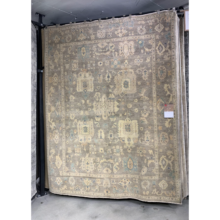 Hand knotted of 100% wool by skilled artisans, the Loloi Vincent Pebble / Pebble Area Rug, or VC-06, offers the look of a well-worn antique rug in a modern day color palette. Each exquisite piece undergoes a weeks-long antique washing process which fades the pattern and color beautifully. 
