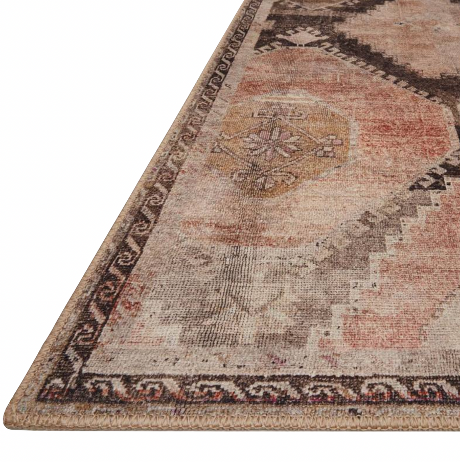 Old soul, new spirit. Power-loomed of 100% polyester, the Wynter Graphite / Blush Area Rug showcases a one-of-a-kind vintage or antique area rug look at an affordable price. The rug is perfect for living rooms, dining rooms, kitchens, hallways, and entryways.  Power Loomed 100% Polyester WYN-08 Graphite/Blush