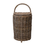 Decorative and functional, this hand-woven rattan Market Basket with Lid is a unique piece. Sitting on casters, this basket can move around easily. Place in the home as a decorative addition.  Size: 16"L x 13"W x 32.5"H Hand-woven Rattan