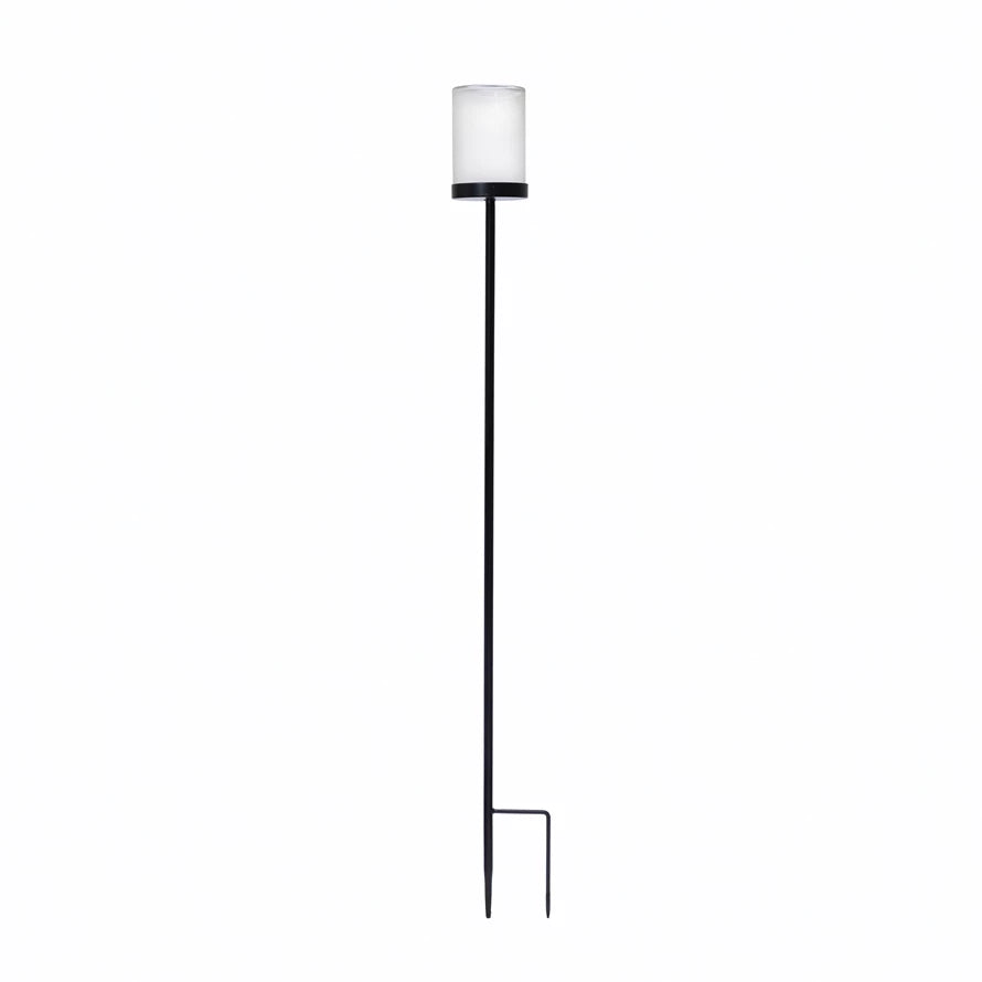 Elevate your outdoor area by adding these chic Metal + Glass Candle Holder/Yard Stake — the new way to light up your summer nights outside.  Size: 5.75"L x 5"W x 49.5"H Metal, Glass