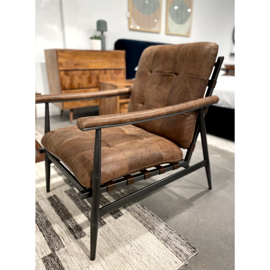 The Shubert Accent Chair is both comfy and classy with its buttery soft top grain leather and high density foam seat. A timeless piece to add to your living room or other living space.   Size: 26.5"W x 34"D x 34.5"H Seat Height: 17" Back Height: 19" Arm Height: 24"