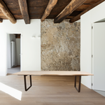 The Wilks Dining Table has a sturdy iron frame with a gorgeous, natural piece of white wood for the top. Each table is completely unique to you!  Size: 118"W x 39"D x 30"H Material: Solid Mango, Iron Legs