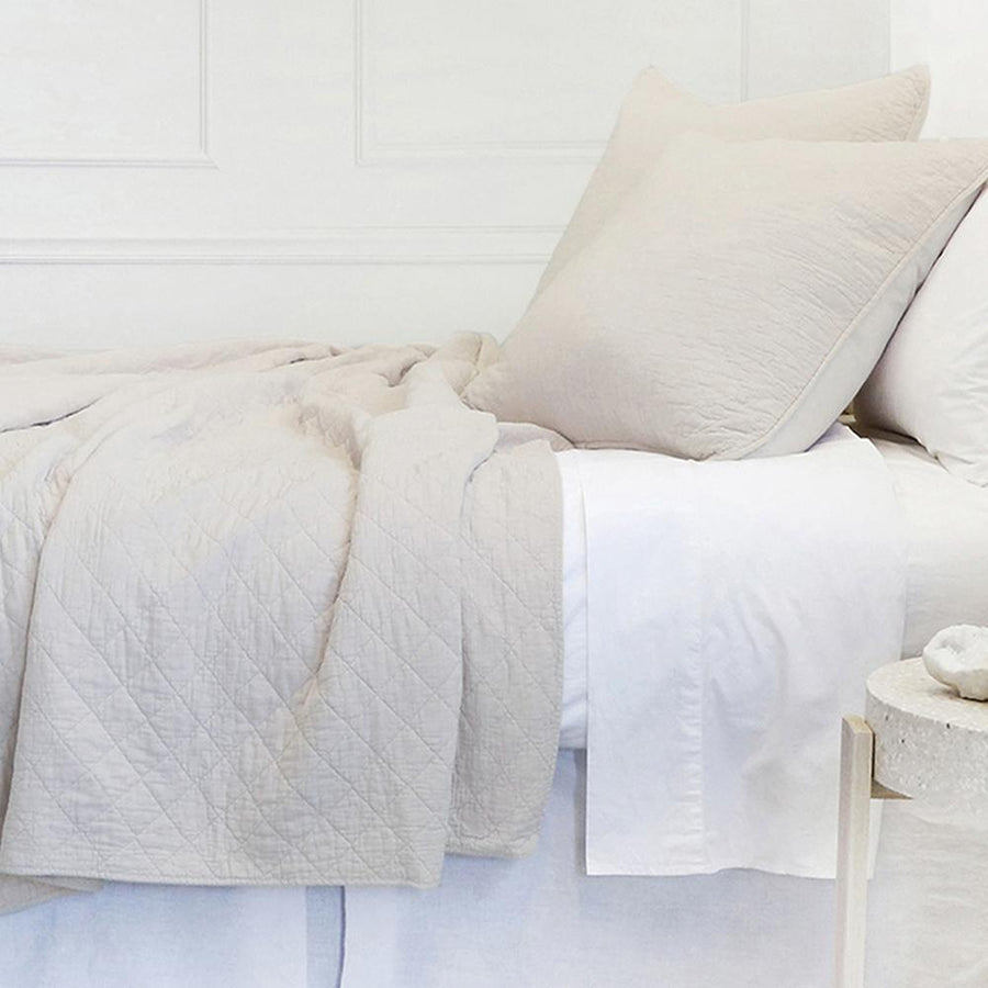 This versatile collection is made of 100% stone washed cotton that offers year-round comfort and luxury. The Huntington Coverlet Bedding Taupe by Pom Pom at Home features a diamond quilted pattern and 1/2" piping along the edges.  100% Cotton Machine wash cold; tumble dry low; warm iron as needed. Do not bleach