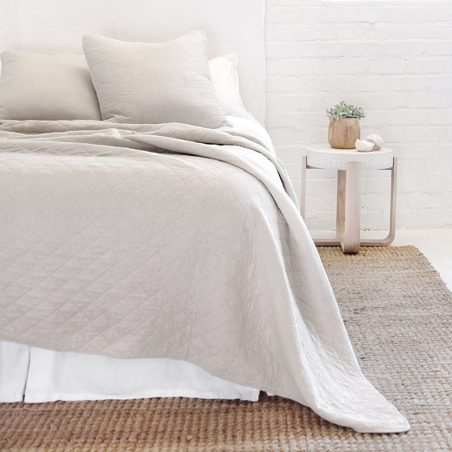 This versatile collection is made of 100% stone washed cotton that offers year-round comfort and luxury. The Huntington Coverlet Bedding Taupe by Pom Pom at Home features a diamond quilted pattern and 1/2" piping along the edges.  100% Cotton Machine wash cold; tumble dry low; warm iron as needed. Do not bleach