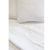 The Marseille Coverlet Bedding White by Pom Pom is luxurious and elegant with a detailed floral and diamond quilted pattern on the front made of 100% stone washed cotton velvet.   100% cotton velvet Machine wash cold; tumble dry low; warm iron as needed Do not bleach