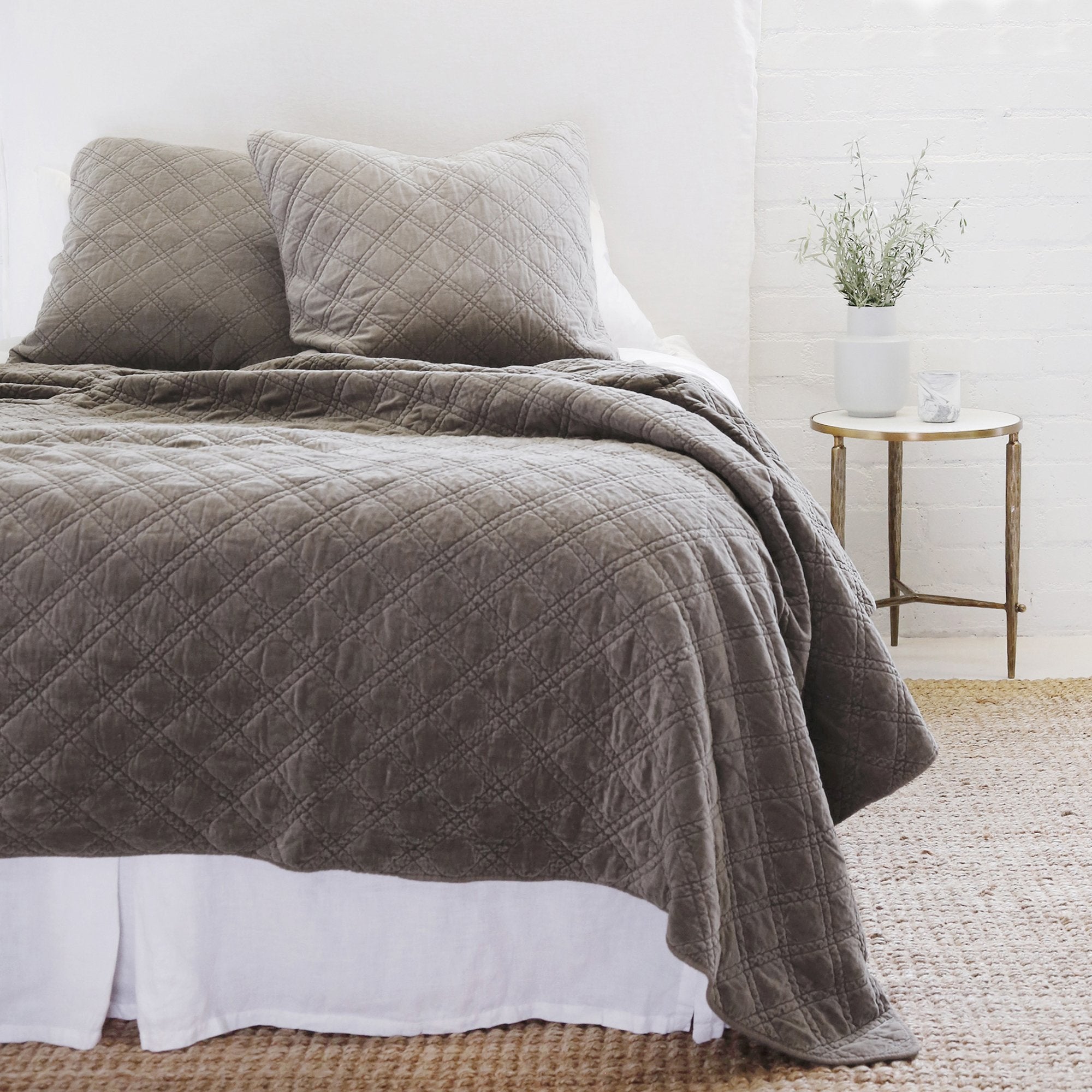 The Brussels Coverlet Bedding Pewter by Pom Pom at Home is a grand and sophisticated line that has a diamond quilted pattern on the front, made of 100% stone washed cotton velvet. Available in several soft, stone washed colors.  100% cotton velvet Machine wash cold; tumble dry low; warm iron as needed Do not bleach