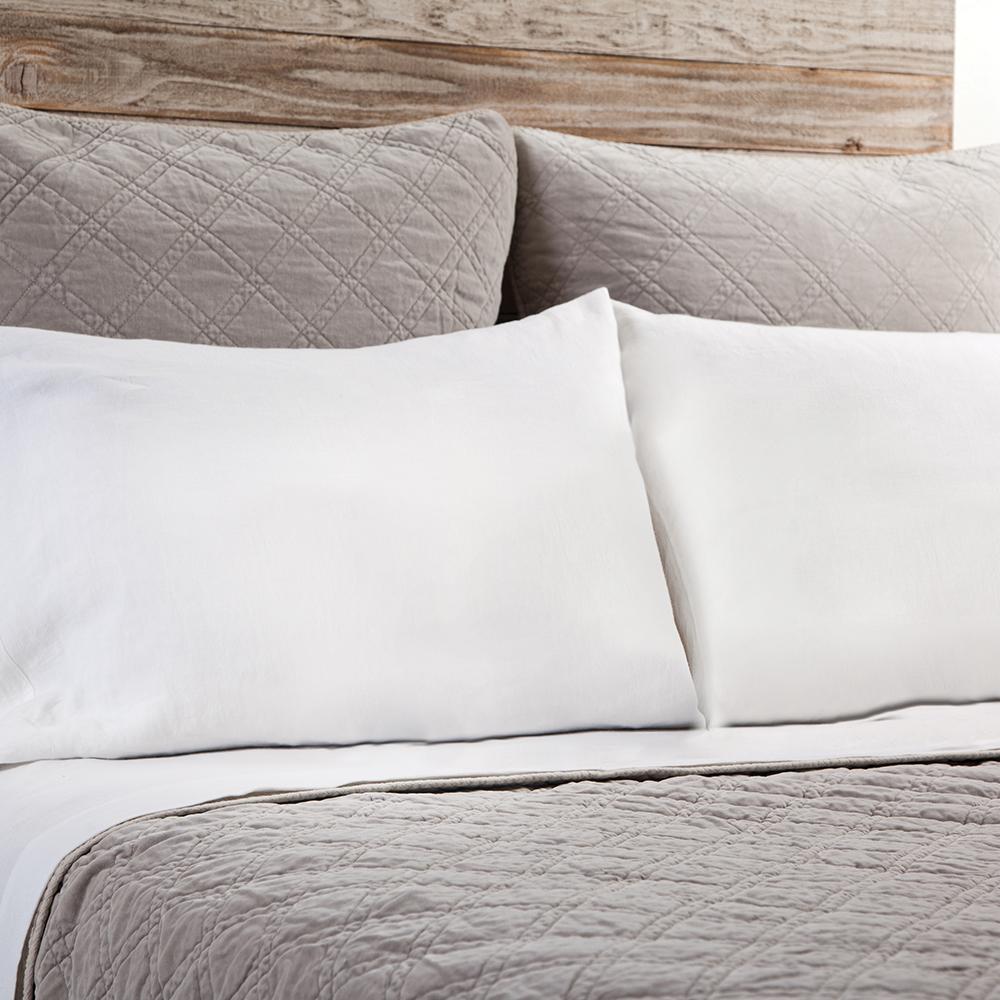 The Brussels Coverlet Bedding Taupe by Pom Pom at Home is a grand and sophisticated line that has a diamond quilted pattern on the front, made of 100% stone washed cotton velvet. Available in several soft, stone washed colors.  100% cotton velvet Machine wash cold; tumble dry low; warm iron as needed Do not bleach