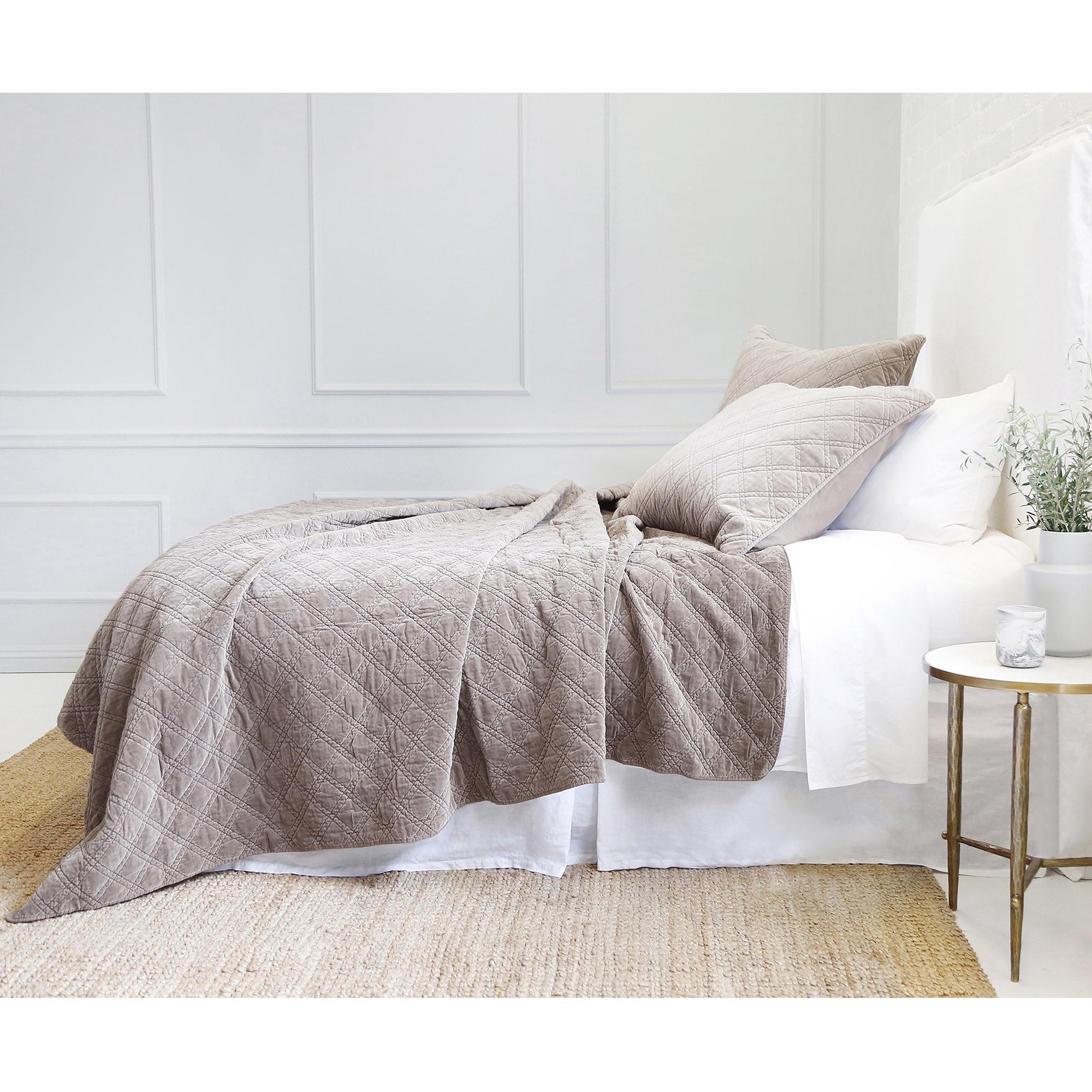 The Brussels Coverlet Bedding Walnut by Pom Pom at Home is a grand and sophisticated line that has a diamond quilted pattern on the front, made of 100% stone washed cotton velvet. Available in several soft, stone washed colors.  100% cotton velvet Machine wash cold; tumble dry low; warm iron as needed Do not bleach