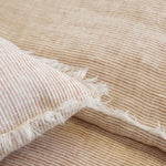 Subtle frayed edges of soft linen add a dash of unexpected detail to this Logan Duvet Collection Terra Cotta by Pom Pom at Home. Woven with two different colored yarns for a heathered effect, the duvet cover and shams feature shell button closures.  Inserts sold separately 100% linen Shell-button closure Machine wash cold; tumble dry low; warm iron as needed. Do not bleach