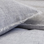 Subtle frayed edges of soft linen add a dash of unexpected detail to this Logan Duvet Collection Navy by Pom Pom at Home. Woven with two different colored yarns for a heathered effect, the duvet cover and shams feature shell button closures.  Inserts sold separately 100% linen Shell-button closure Machine wash cold; tumble dry low; warm iron as needed. Do not bleach