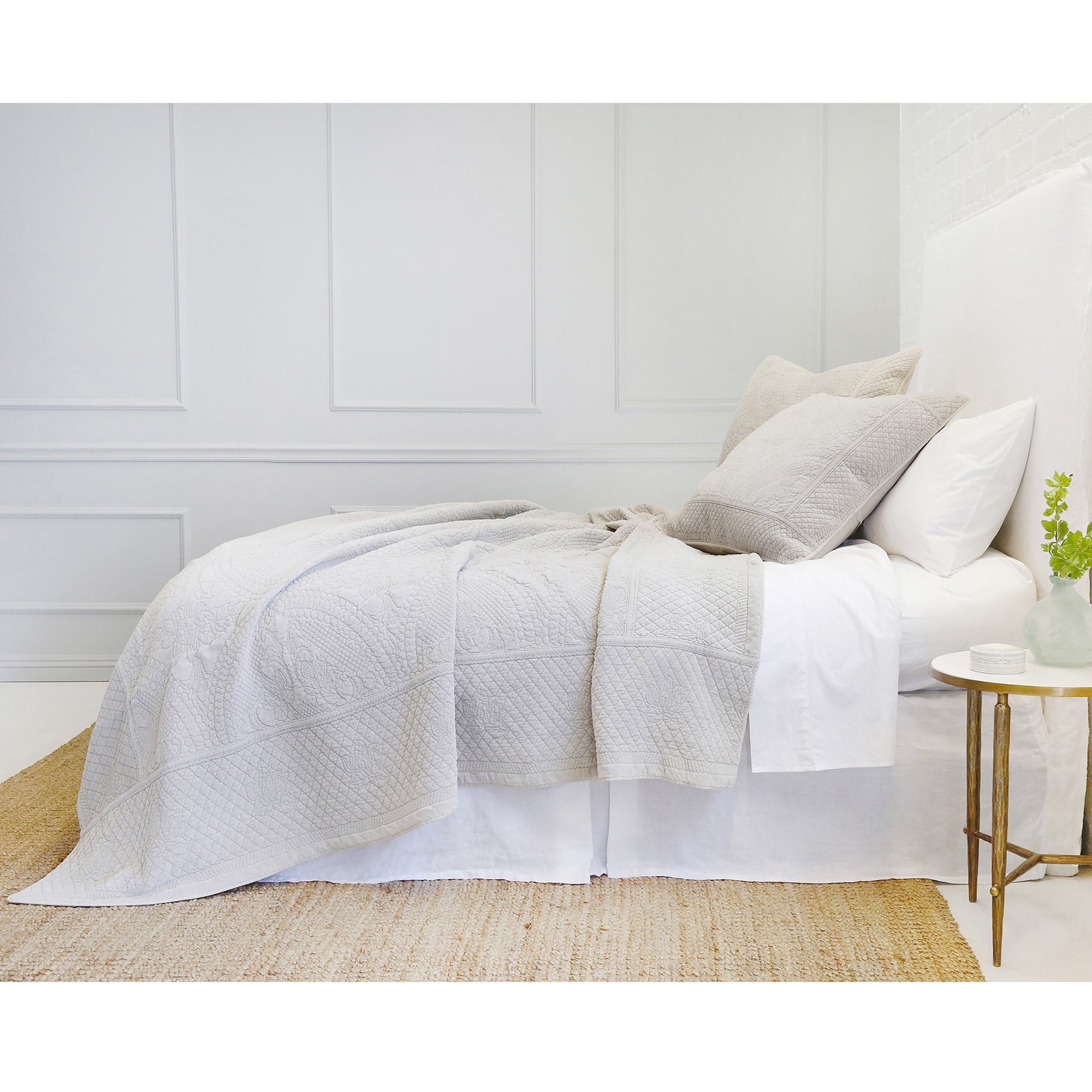 The Marseille Coverlet Bedding Taupe by Pom Pom at Home is luxurious and elegant with a detailed floral and diamond quilted pattern on the front made of 100% stone washed cotton velvet.  100% cotton velvet Machine wash cold; tumble dry low; warm iron as needed Do not bleach 