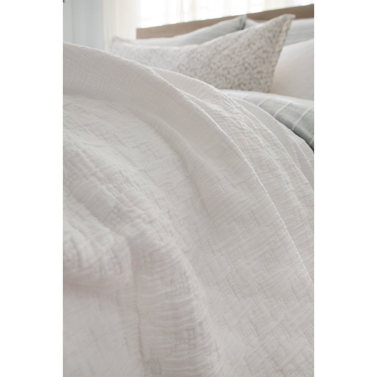 Crafted in Portugal, the Ojai matelasse by Pom Pom at Home is light and casual, bringing comfort with its subtle diamond pattern. The coziest bedding to climb into after a long day.   100% cotton. Machine wash cold; tumble dry low; warm iron as needed. Do not bleach 
