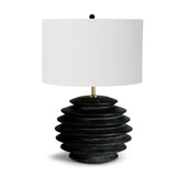 We love the groves found on this Accordion Table Lamp Round. Made from birch wood with a pronounced grain and ebony finish, this brings a sleek, modern look to any living room, bedroom, or other space.   Size: 18"w x 18"d x 26"h  Shade Dims: 18 x 18 x 11