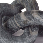 This Cassius Marble Sculpture - Black is hand-carved from a single piece of stone and an abstract beauty. Place on your coffee table, shelve, or entryway and elevate the whole space!  Overall size: 8"w x 8"d x 5.5"h Material: Marble