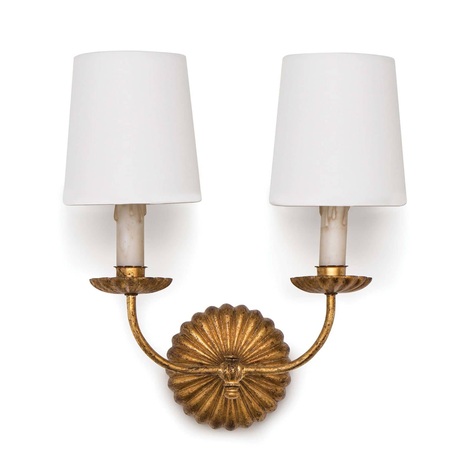 This Clove Double Sconce features antique gold leaf finish, with two antique-inspired candle holding crisp, modern shades -- a unique sconce for any hallway, living room, or dining room.   Overall Dimensions: 13.75"w x 7.5"d x 15.75"h