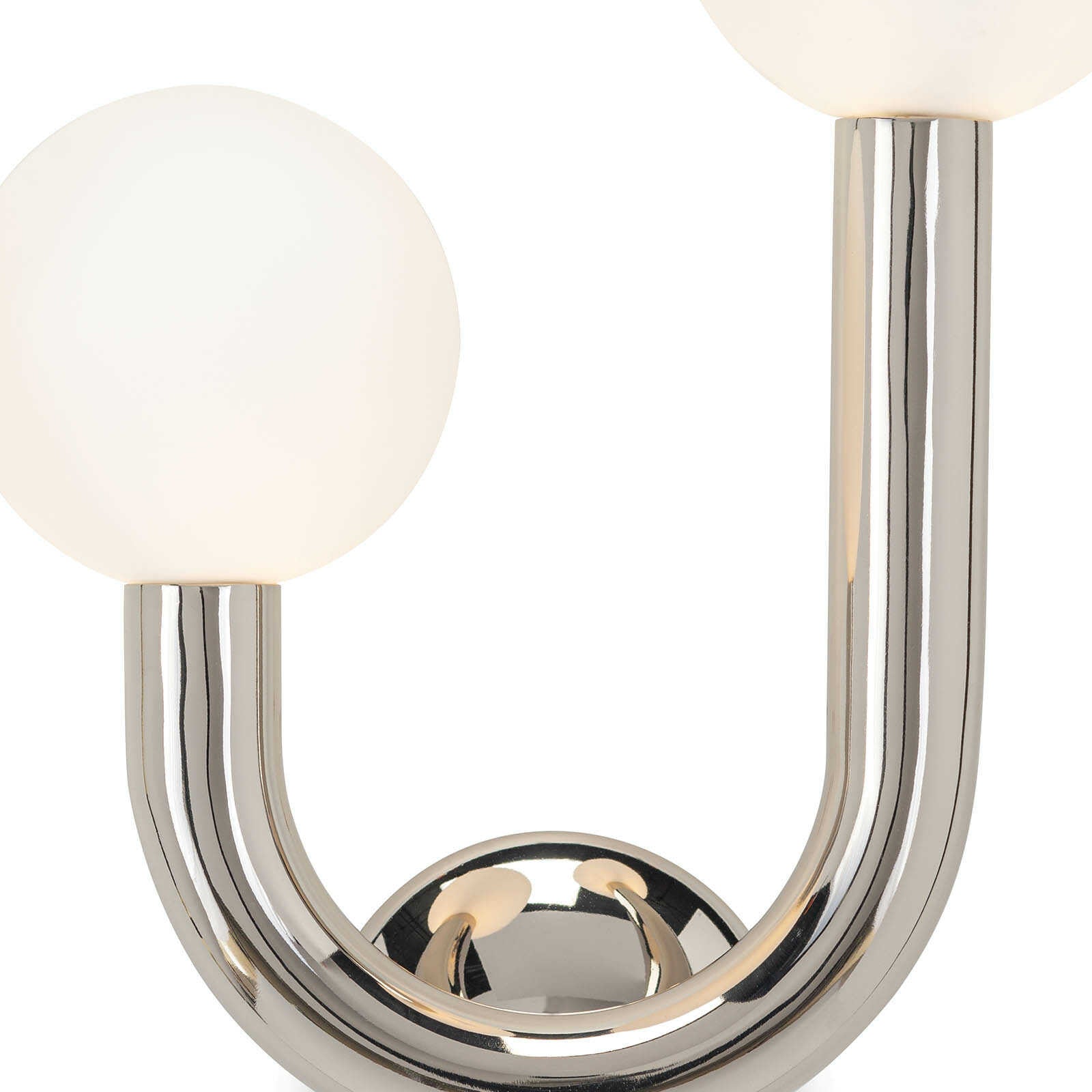 We love the unique, symmetrical shape of this Happy Sconce. This adds a modern yet playful lighting to any kitchen, living room, or other area needing extra lighting.    Overall Dimensions: 11.25"w x 5.5"d x 16.25"h