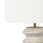 Like sun aged driftwood, the Nova Wood Table Lamp white-washed wooden body is the perfect piece of coastal-inspired lighting. Light distressing accentuates Nova's signature carved ridge detailing and a classic, natural linen drum shade with natural brass ball finial completes the look.   Overall Dimensions: 14"w x 14"d x 25"h