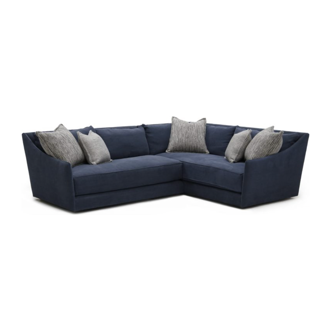 We love the curved arms of the  Mabel Sofa Family, a Verellen best seller. This comfy sofa will be a family favorite for years to come and features the following:   spring down seat construction notch bottom back pillows knife edge toss double needle stitch detail recessed legs upholstered only