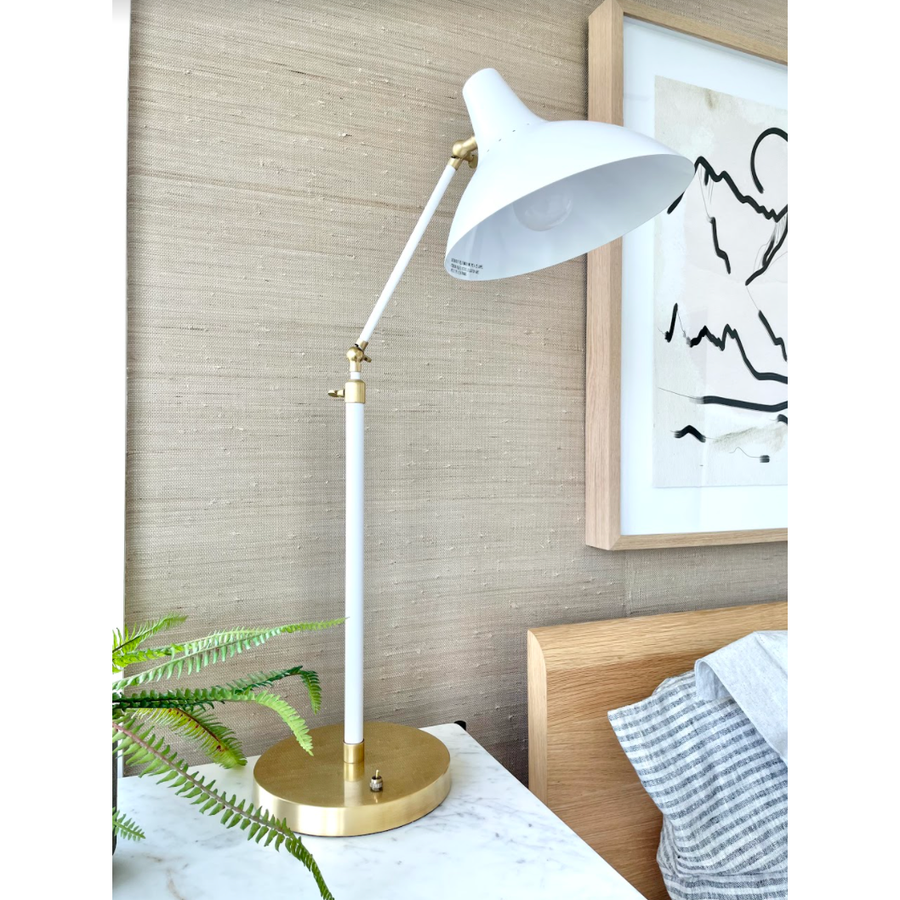 We love the hand-rubbed antique brass matched with either plaster white or black in this Charlton Table Lamp. This is the perfect lamp for your office, bedroom, or other space needing controlled light.   Designer: AERIN