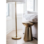We love the silk shade and dimmer feature of the Simple Soft Brass Floor Lamp by Visual Comfort. It adds an elegant, warm glow to any living room, bedroom, or other area needing extra light.   Designer: Barbara Barry